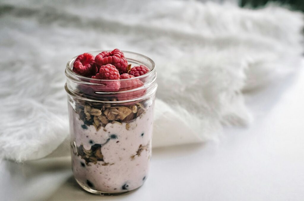 Yogurt parfaits, acai bowls, and chia pudding are delicious breakfast options for teenagers. 